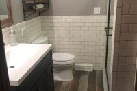 rustic and industrial basement bathroom