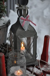 a metal candle lantern with a fabric heart, a glass candle lantern will suit outdoor decor, too