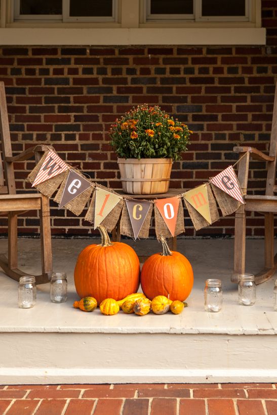 a burlap banner with bright fabric and stenciled letters is a lovely and bright decoration for the fall and Thanksgiving