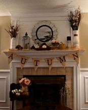a burlap banner with black letters made with paint is a stylish and cool idea for fall and Thanksgiving, it looks rustic and very cozy