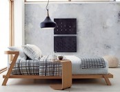 a plywood mid-century modern bed with a matching mini side table is a stylish solution for a cozy bedroom