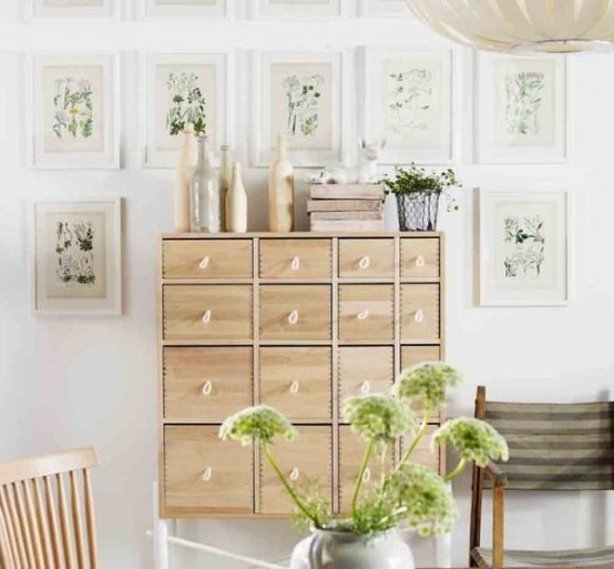 A wall-mounted chest of drawers won't occupy much space but would provide lots of concealed storage space. Lots of stuff could fit in such storage unit.