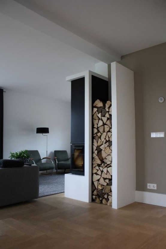 Displaying firewood might add an natural-looking touch to your decor so don't try to hide it all away.
