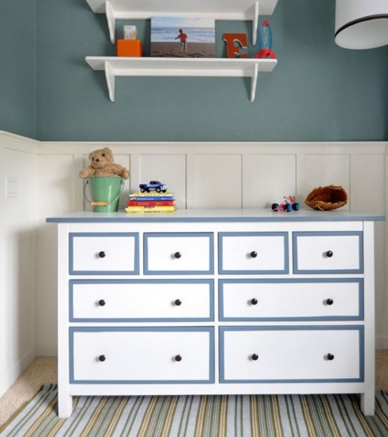 With some blue paint you can add some style to a plain white Hemnes dresser so it would fit a boy's room