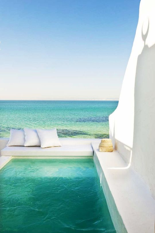 small Grecian-styled terrace with a plunge pool