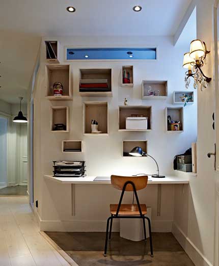 Even in a hallway you could organize a cozy working area with lots of storage.