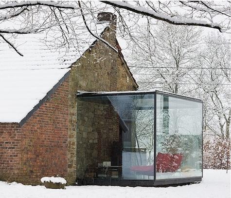 Small yet cozy sunroom house extension. Perfect little nook to enjoy winter weather in warmness.