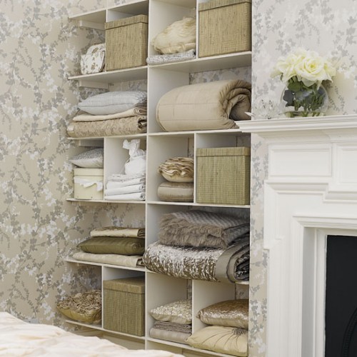 Even if your bedroom walls are covered with a wallpaper you can make built-ins blend in.
