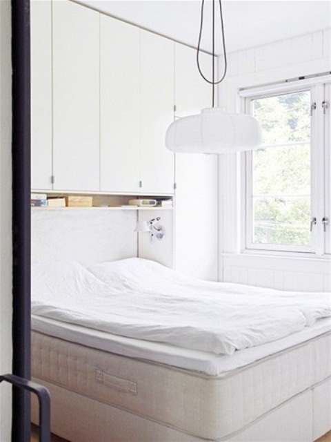 This is a super practical idea for a small bedroom storage. Every inch of space is effectively used.