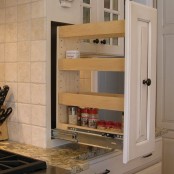 a drawer with spice racks is a nice piece by the cooker, you can cook and add spices any time, it’s very comfortable