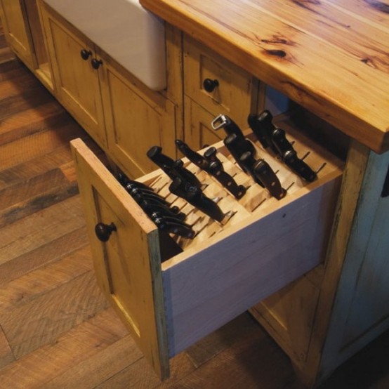 a small drawer for storing knives is a cool idea for a kitchen, you can hold all your knives there