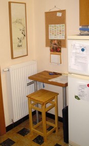 an IKEA Oddvar stool used in the tiny home office nook – no special hacks are necessary here