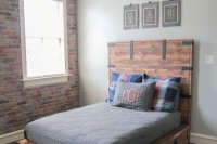 a rustic stained wooden bed with drawers in the sides is a nice piece for a rustic bedroom and it will give you much storage space