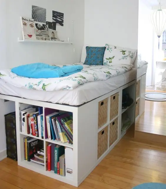 a white storage bed with lots of open storage compartments and some basket drawers is a cool option to go for
