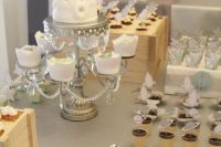 space-themed dessert table for a modern baby shower