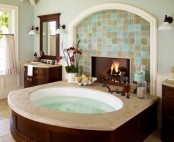 a vintage bathroom with a rustic feel, with stained furniture and a tub, with a built-in fireplace, potted plants and blooms