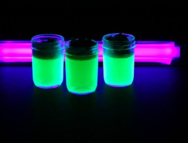 Neon green jelly in jars with graveyard ground (chocolate) is a gorgeous idea for a grown up Halloween party