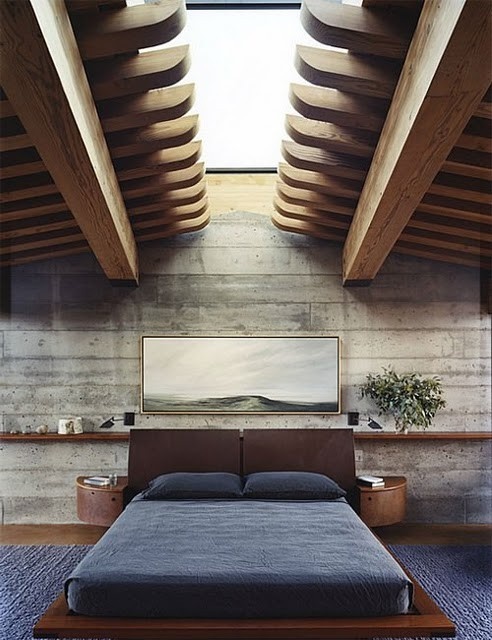 With such ceiling and rough concrete walls any bedroom would worth a real man.