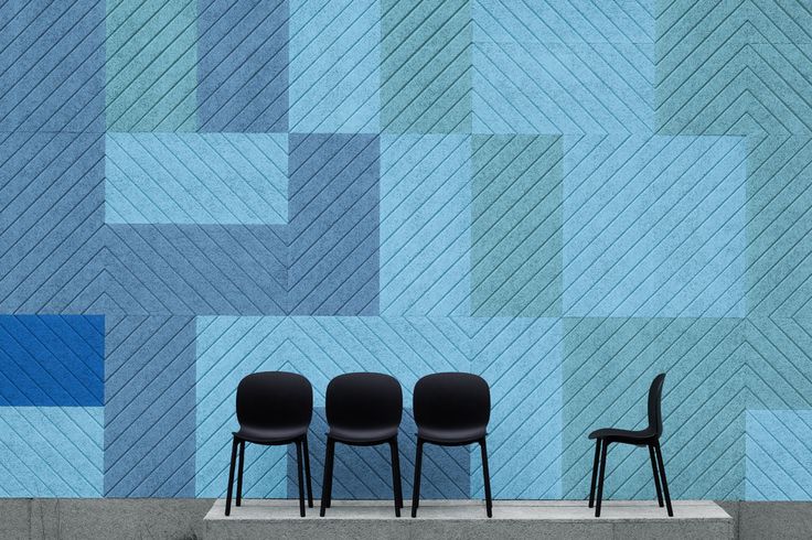 Pastel colored geometric acoustic panels are a bold and chic ideda to decorate and sounnd proof the space