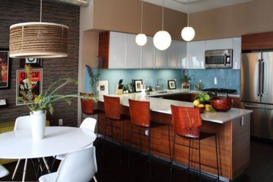 a rich-stained and white mid-century modern kitchen with a blue backsplash, pendant lamps and tall stools