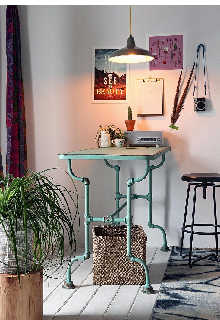A beautiful industrial desk of aqua colored pipe legs and a light stained wooden desk is a pretty idea for a modern home office, and a touch of color