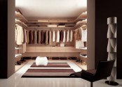 a minimalist closet done of neutral-colored plywood, lots of lights and a striped rug for a cozy touch