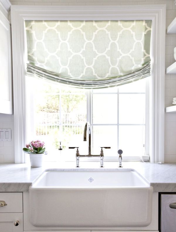 A lovely green printed Roman shade is a cool idea for a modern or vintage farmhouse kitchen or some other room