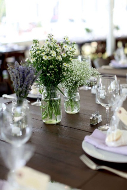 simple neutral wildflower centerpieces are always good for a spring table