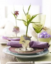 a cute spring place setting done in green and purple and an egg card holder
