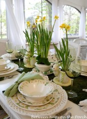daffodils in vases and pots and some funny bunnies for a centerpiece