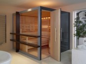 a small steam room clad with natural wood and with some intimate built-in lighting for a relaxed ambience and feel