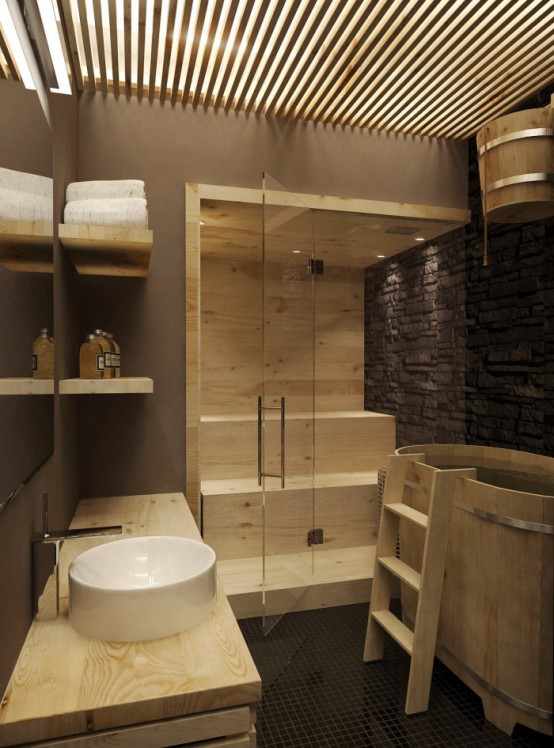 a tiny steam room fully clad with wood, with step benches and glass doors is a lovely relaxation oasis