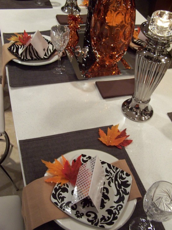 a round white plate and a square black and white printed plate for a more modern and unusual look for Thanksgiving