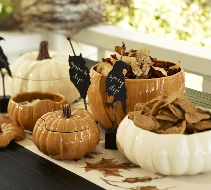 Porcelain pumpkin shaped bowls can be a nice solution for a fall or Thanksgiving tablescape and they can be rocked at Halloween for serving treats