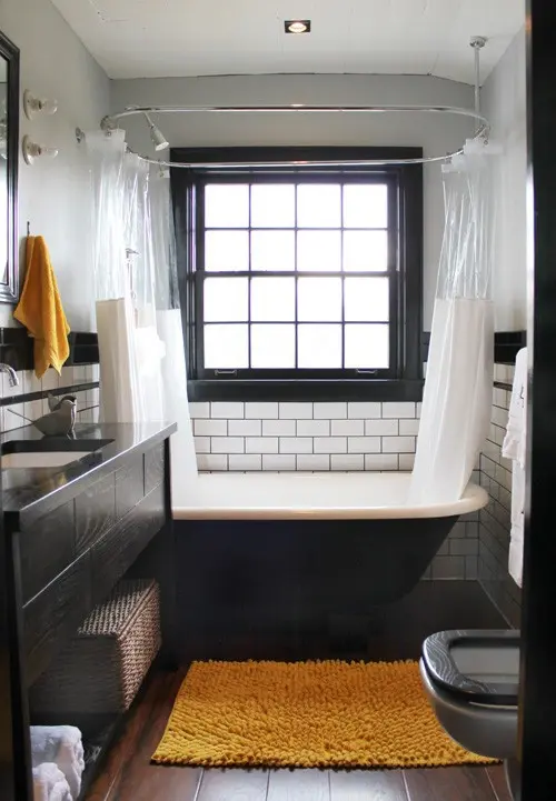 White subway tiles looks great in masculine bathrooms but make sure to mix them with lots of dark elements. That could be vanities, bathroom accessories, bathtubs and even such things as doors and window frames.