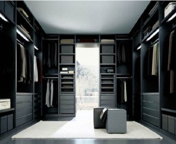When you have a floor to ceiling window in your walk-in closet you can pull off a dark color scheme without any worries.