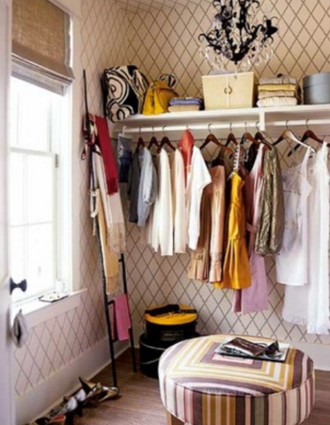 A small wooden ladder could become a great solution to organize your scarves.