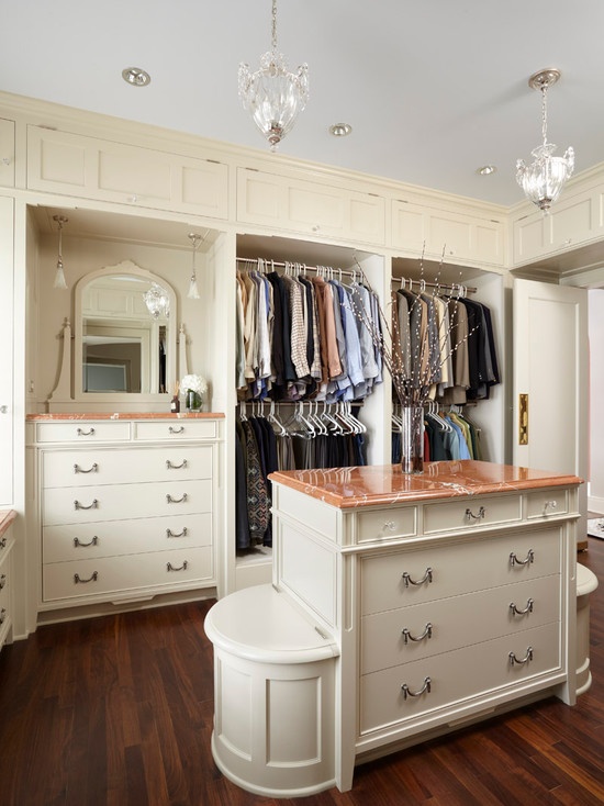 An island in a walk-in closet could provide lots of storage space and become a centerpiece of a room where you could display your accessories or some decor.