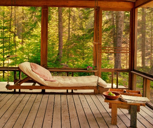 Every sunroom should have a cozy daybed. So great place to relax.