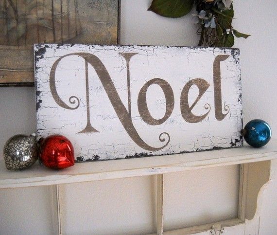 A simple vintage Christmas sign with a single word can be easily DIYed by you to make any space or nook feel holiday like