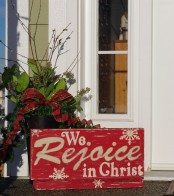 a vintage red and white Christmas sign is a super cool and chic decor idea for the holidays