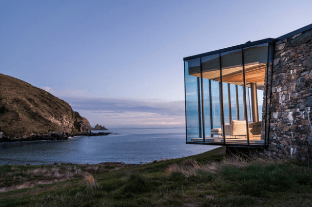 Sustainable oceanfront cabin on volcanic mountainside  1