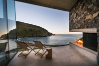 sustainable-oceanfront-cabin-on-volcanic-mountainside-10