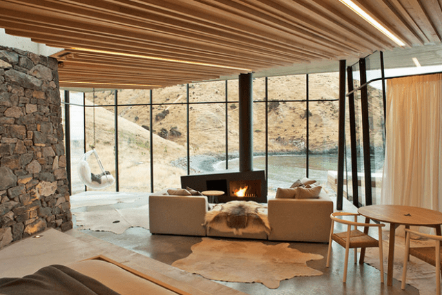 Sustainable oceanfront cabin on volcanic mountainside  6