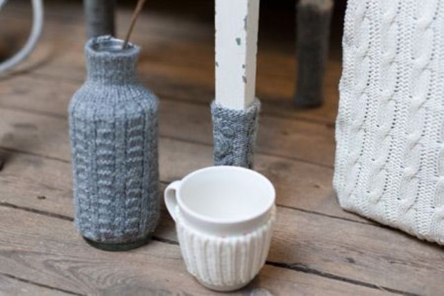 Dress up vases and mugs with cozies to make your space cooler and cozier   these cozies can be DIYed or just bought