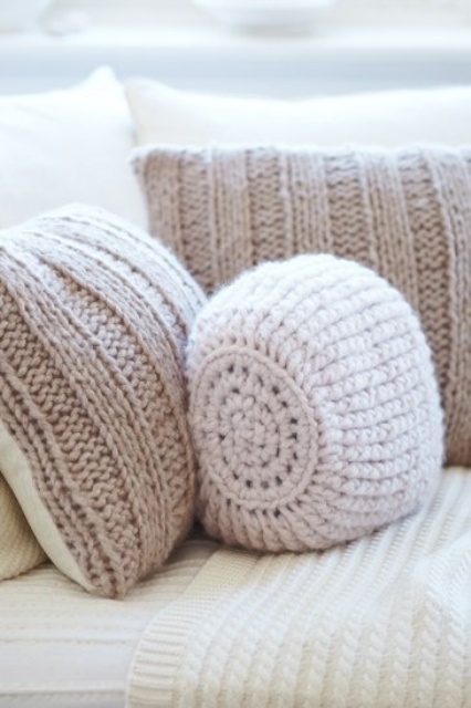 lovely neutral pillows covered with crochet pillow cases will make your living room fall and winter-ready