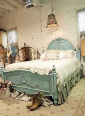 a neutral shabby chic bedroom with white brick walls, a mint-colored bed, refined neutral bedding and a pendant lamp plus beautiful details