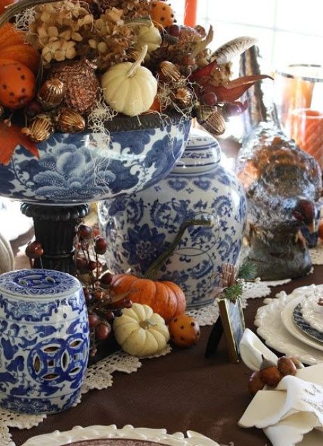 fantastic blue and white porcelain - vases and jars wiht lids are great for sprucing up your fall-colored tablescape and making it unusual