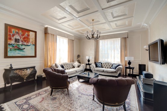 Traditional Interior Design In Creme Color Scheme With Dark Furniture
