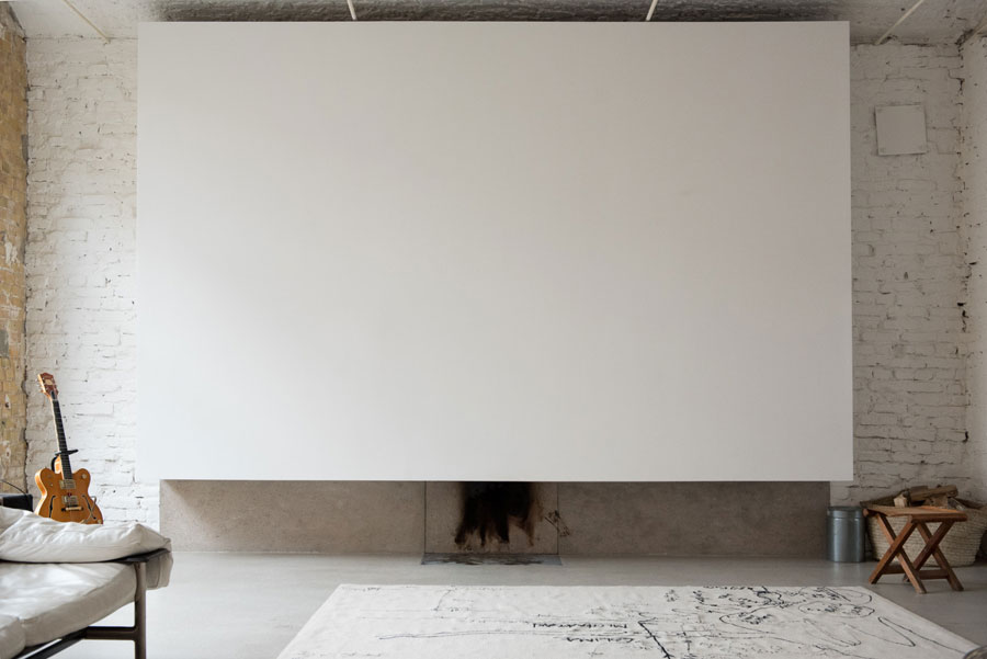 Uncluttered artists loft in neutral colors  3